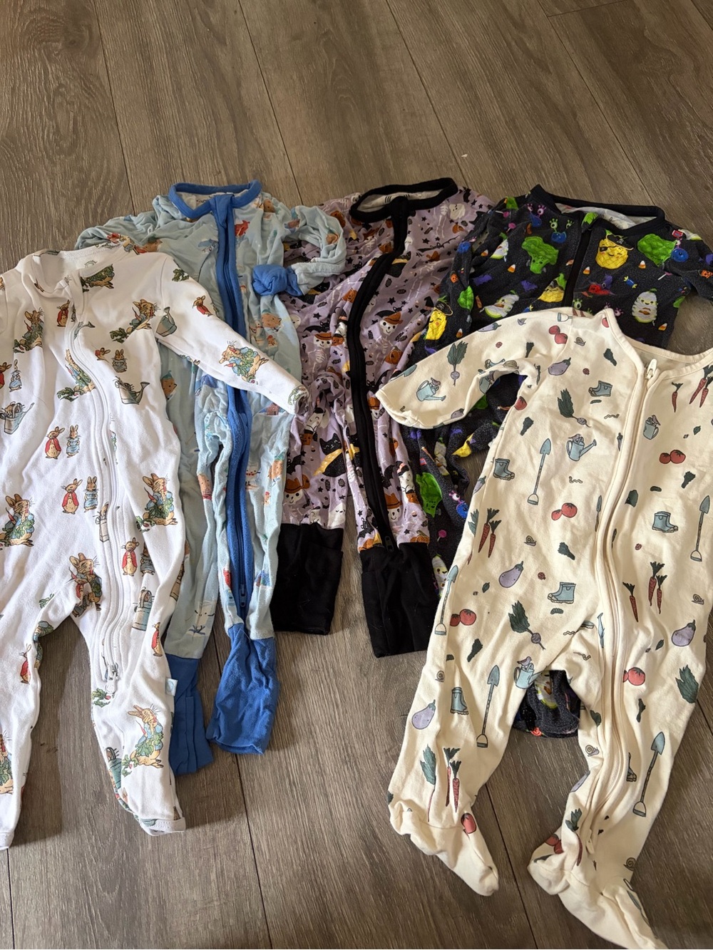 Assorted Kids Footed Pajama One-Pieces – White, Light Blue, Purple, Black